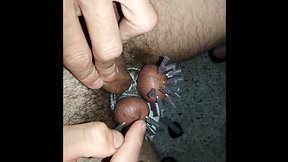 Needles in my balls with a. injection and masturbating til exploding