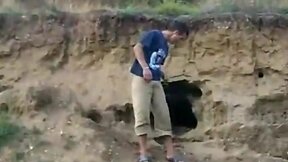 Naked in a grassy field