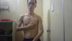 Skinny Asian nerd masturbates