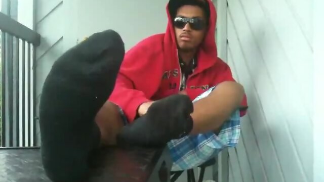 Gay black boy shows feet